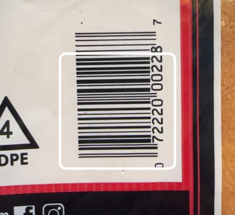The camera framing the barcode on a packet of hot dog buns